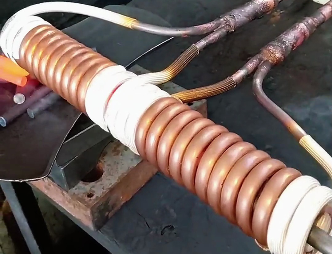 用高頻加熱機(jī)對(duì)金屬小棒在線加熱